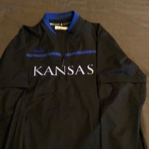 Adidas    Nylon windbreaker    Brand New.  Never worn.  Blue highlights